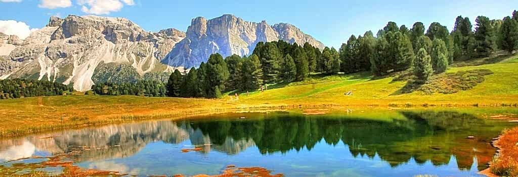 Mountains and lake landscape in Dolomites.